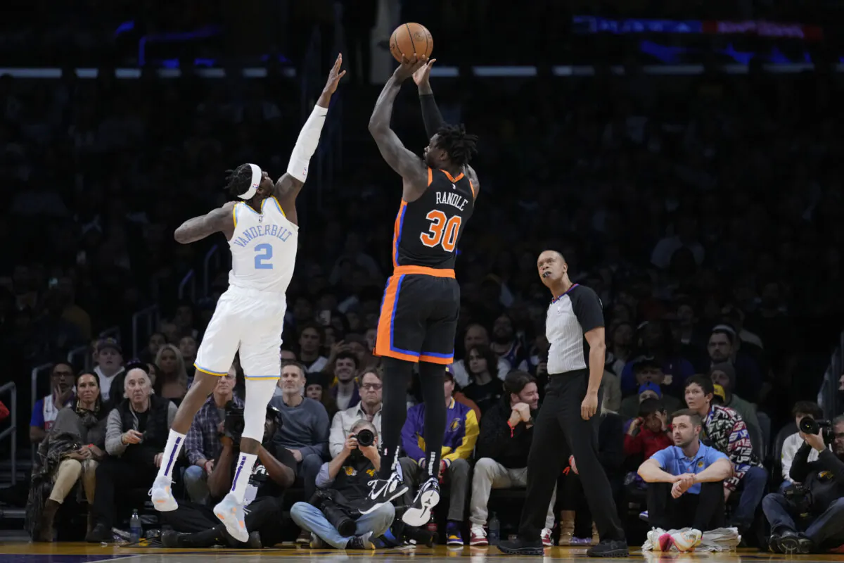 New York Knicks forward Julius Randle (30) shoots over Los Angeles Lakers forward Jarred Vanderbilt (2) during the first half of an NBA basketball game in Los Angeles on March 12, 2023. (Marcio Jose Sanchez/AP Photo)