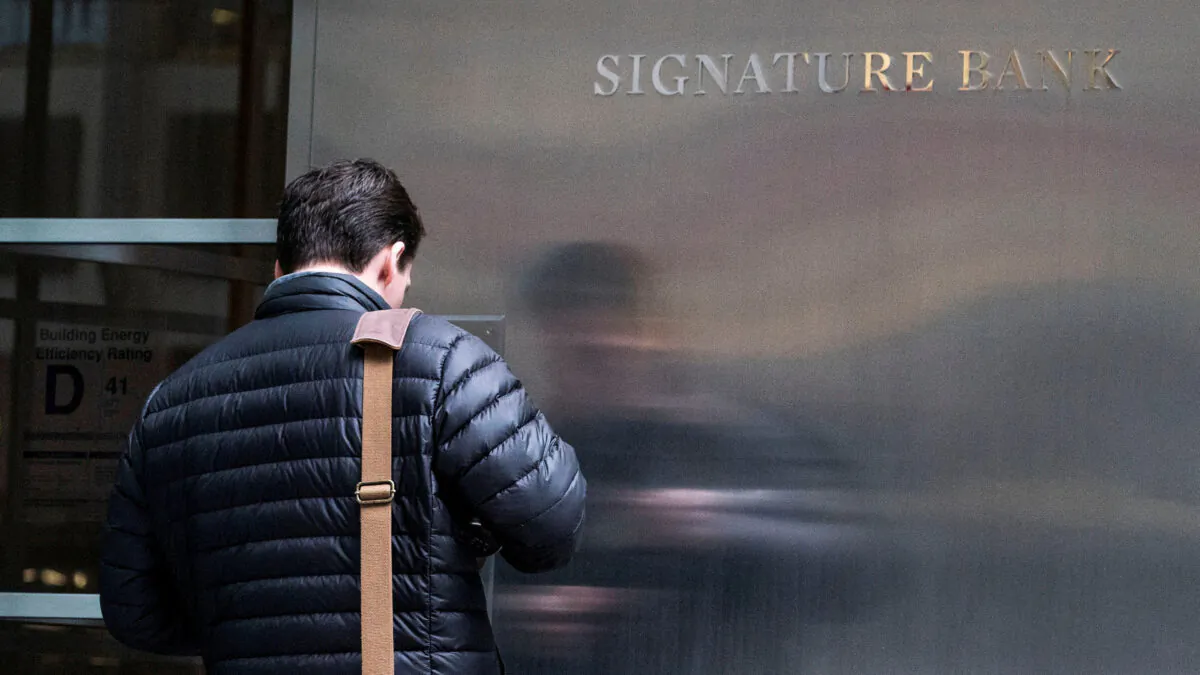 A worker arrives to the Signature Bank headquarters in New York on March 12, 2023. (Eduardo Munoz/Reuters)