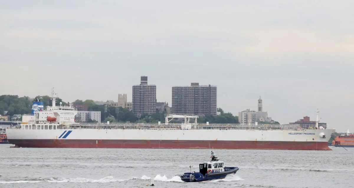 A New York City Police (NYPD) boat passes by the Hellespont Progress, an oil tanker anchored in New York Harbor in New York City on May 24, 2022. (Brendan McDermid/Reuters)