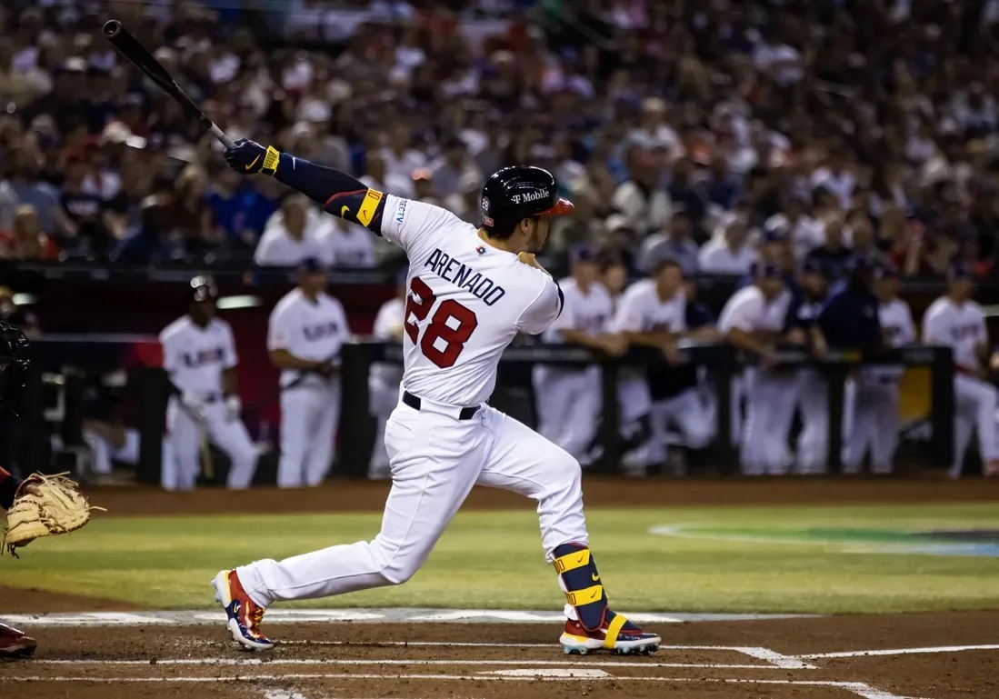 USA third baseman Nolan Arenado hits a two run double in the first inning against Canada during the World Baseball Classic at Chase Field in Phoenix on Mar 13, 2023. (Mark J. Rebilas/USA TODAY Sports via Field Level Media)