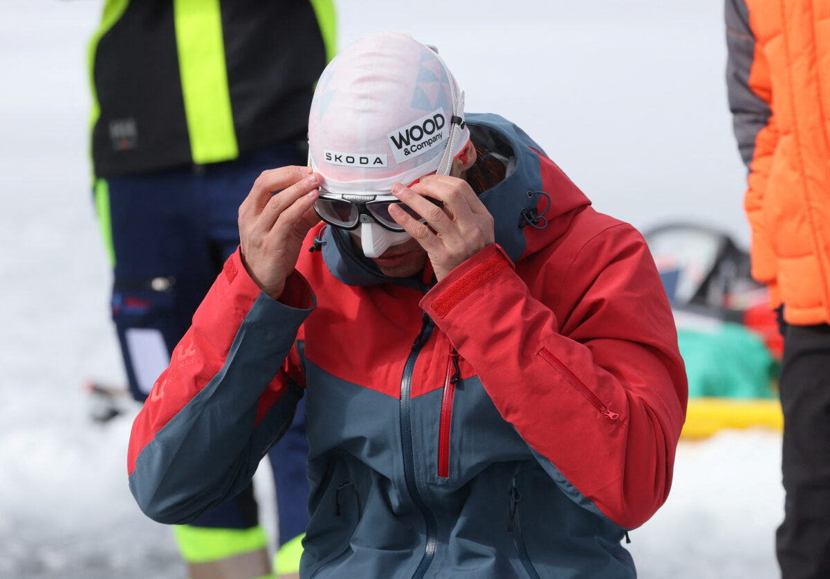 NextImg:Free-Diver Plunges to Record Depth Beneath Frozen Swiss Lake