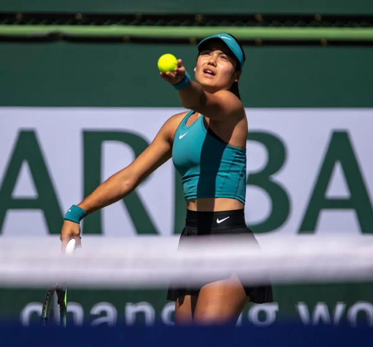 Emma Raducanu of Great Britain prepares a serve to Beatriz Haddad Maia of Brazil during their third-round match at the BNP Paribas Open at the Indian Wells Tennis Garden in Indian Wells, Calif., on March 13, 2023. (© Andy Abeyta/The Desert Sun/USA TODAY NETWORK via Field Level Media)