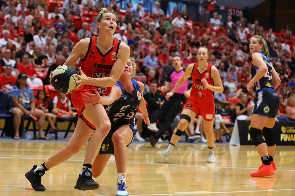 Sami Whitcomb of the Lynx drives to the basket against Shyla Heal of the Fire during game two of the WNBL Semi Final series between Perth Lynx and Townsville Fire at Bendat Basketball Stadium in Perth, Australia on March 12, 2023. (Paul Kane/Getty Images)