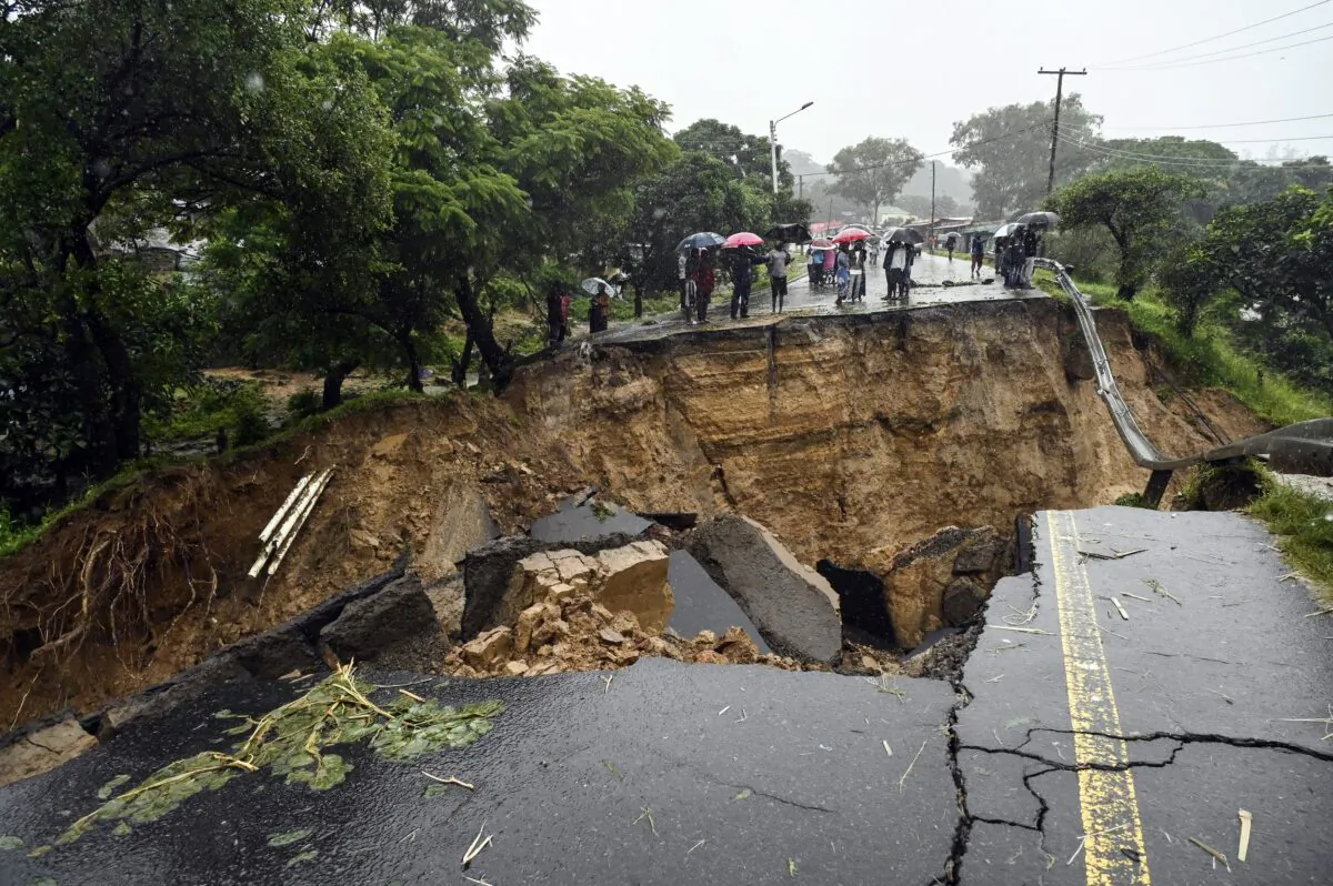 A road connecting the two cities of Blantyre and Lilongwe is seen damaged following heavy rains caused by Tropical Cyclone Freddy in Blantyre, Malawi, on March 14 2023. (Thoko Chikondi/AP Photo)