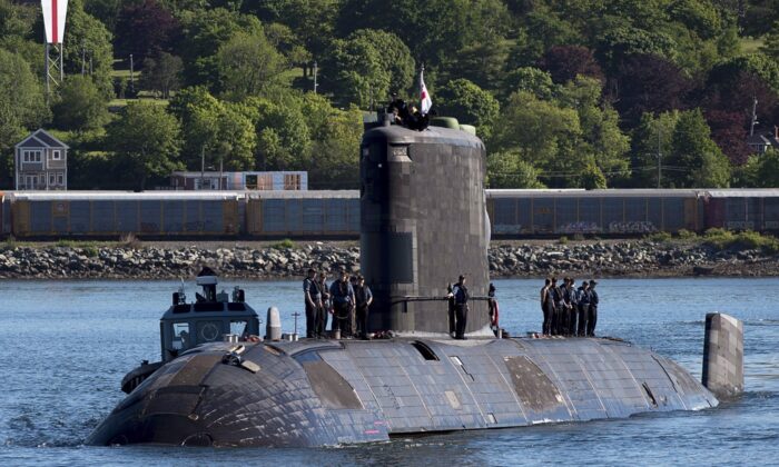 HMCS Windsor, one of Canada's Victoria-class long range patrol submarines, returns to port in Halifax on June 20, 2018. (The Canadian Press/Andrew Vaughan)