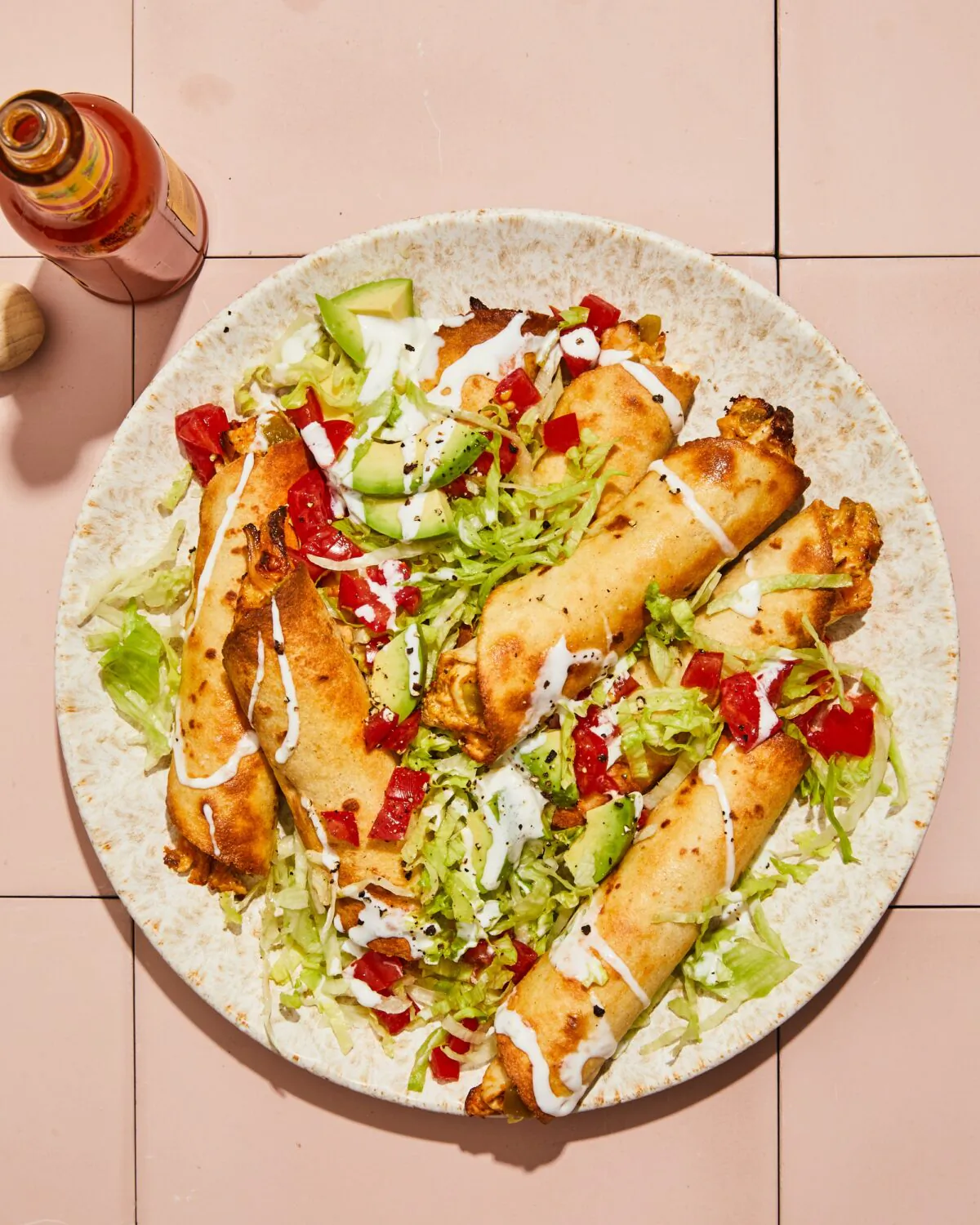 Air fried taquitos are crispy and ready to be dunked in salsa, guacamole, or crema. (Courtesy of TheKitchn.com)