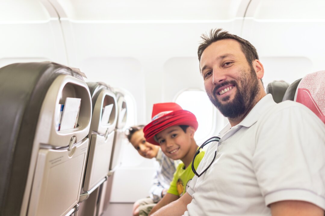 Ed Perkins talks about airlines consumer issues, such as no-fee family seating policies. (ESB Professional/Shutterstock)