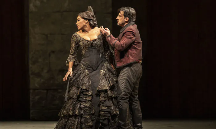 Carmen (mezzo-soprano J’Nai Bridges) rejects the advances of Don Jose (tenor Charles Castronovo) in the Lyric Opera’s production of “Carmen.” (Todd Rosenberg)