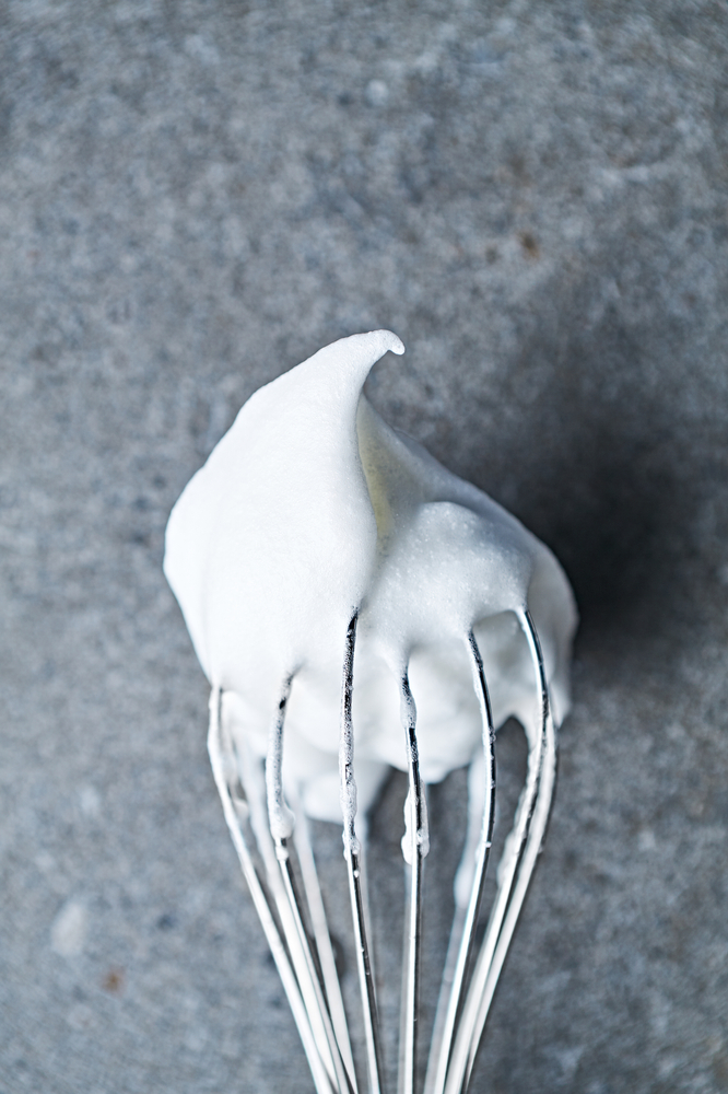 Beaten,Egg,White,On,A,Whisk.,Close-up.,Home,Cooking,Concept