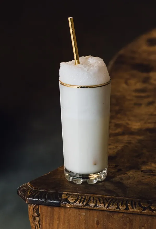 The ingredients are gin, citrus, simple syrup, egg white, heavy cream, orange flower water, and club soda—but the process is the key. (Nicole Kandi/Shutterstock)