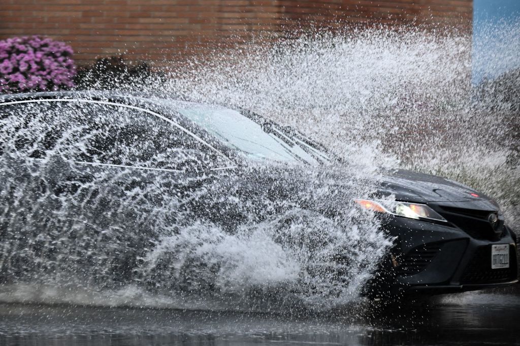 NextImg:Motorists Stranded by Flooding, Potholes in Southern California