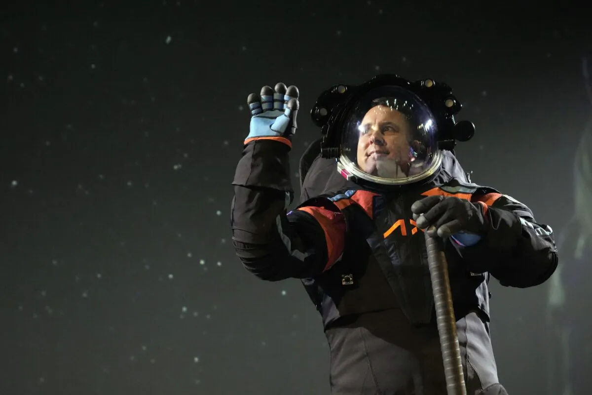 Axiom Space chief engineer Jim Stein demonstrates a prototype spacesuit in Houston on March 15, 2023. (David J. Phillip/AP Photo)