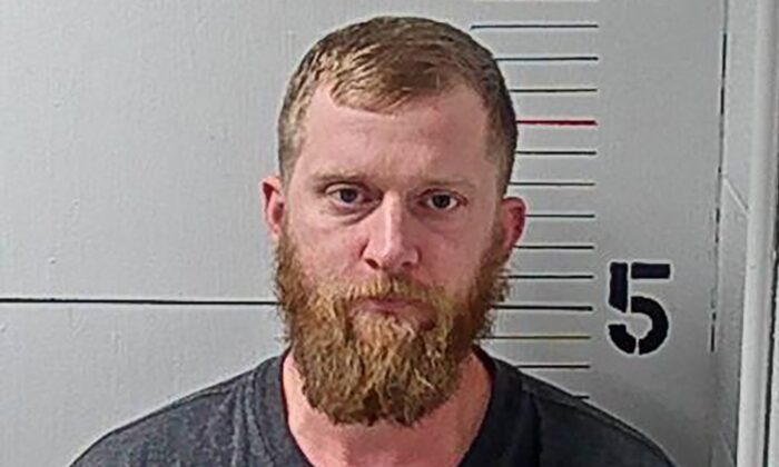 Kyle Chrisley in a police booking photo. (Rutherford County Adult Detention Center via Getty Images)