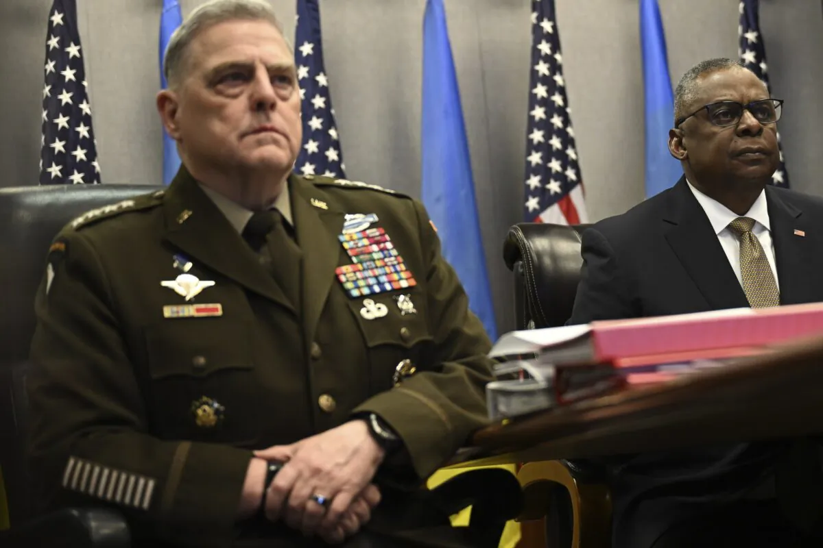 Defense Secretary Lloyd Austin (R) and Chairman of the Joint Chiefs of Staff Gen. Mark Milley, attend a virtual meeting of the Ukraine Defense Contact Group at the Pentagon in Washington on  March 15, 2023. (Andrew Caballero-Reynolds/Pool via AP)