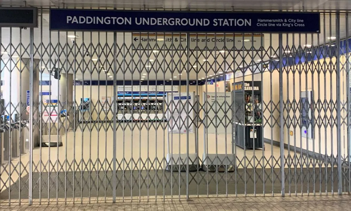 The entrance, locked because of industrial action, at Paddington Underground station in central London, on March 15, 2023. (PA)