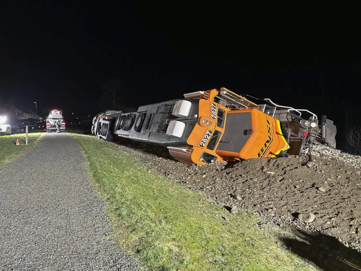 A derailed BNSF train on the Swinomish tribal reservation near Anacortes, Wash., on March 16, 2023. (Washington Department of Ecology via AP)