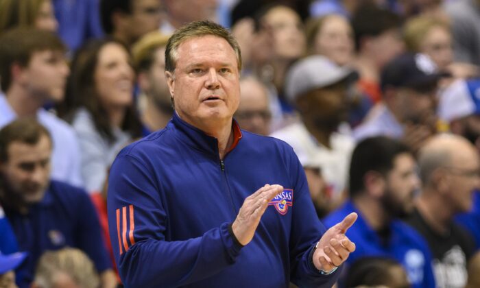 Kansas head coach Bill Self applauds his team's play against Texas Tech during the first half of an NCAA college basketball game in Lawrence, Kan., on Feb. 28, 2023. (Reed Hoffmann/AP Photo)