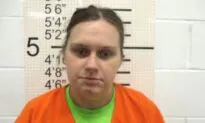 Newborn Found Dead in Iowa Ditch; Mother, Grandfather Charged