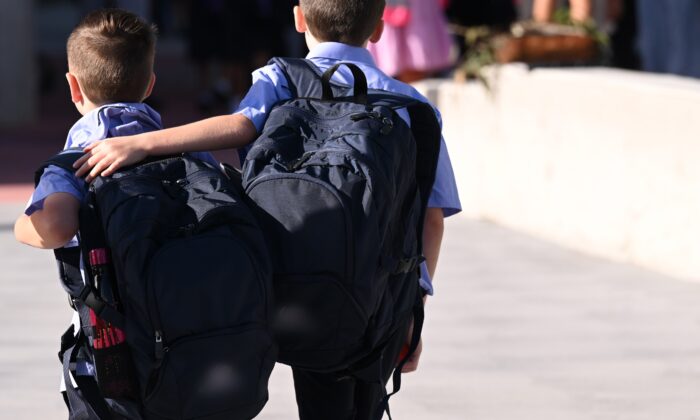 NSW Students return to school on the first day of term one for 2023 in Sydney, Australia, Jan. 31, 2023. (AAP Image/Dean Lewins)
