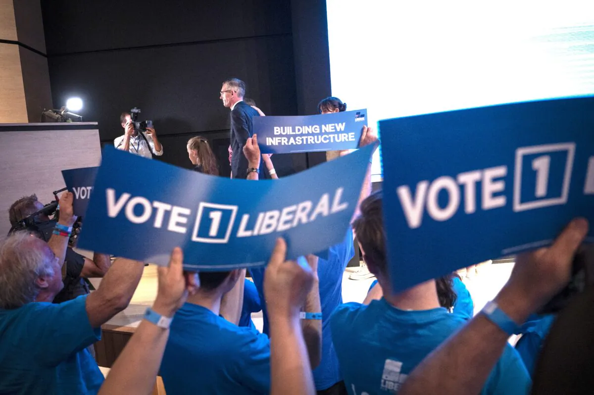Former New South Wales Premier Dominic Perrottet leaves the New South Wales Liberal party campaign launch, ahead of the 2023 New South Wales state election, at Liverpool Catholic Club in Sydney, Australia, on March 12, 2023. (AAP Image/Flavio Brancaleone)