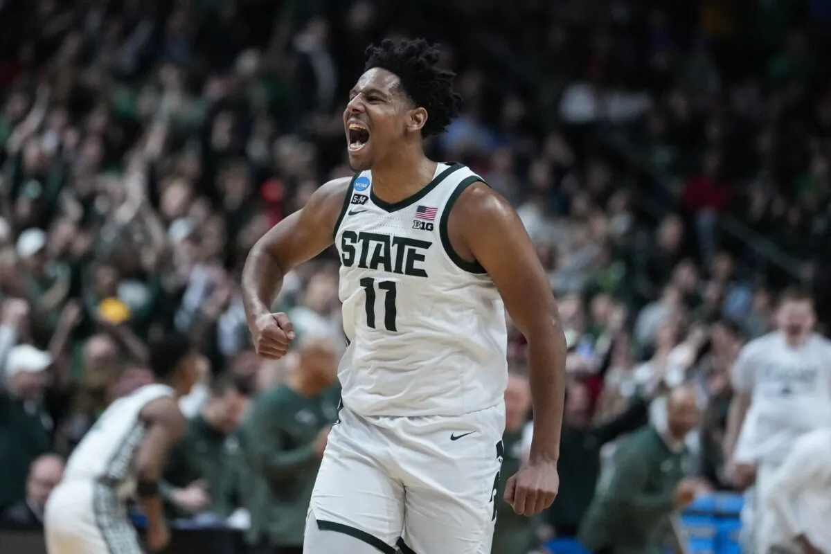 Michigan State guard A.J. Hoggard (11) celebrates in the second half of a first-round college basketball game against Southern California in the men's NCAA Tournament in Columbus, Ohio, on March 17, 2023. (Michael Conroy/AP Photo)