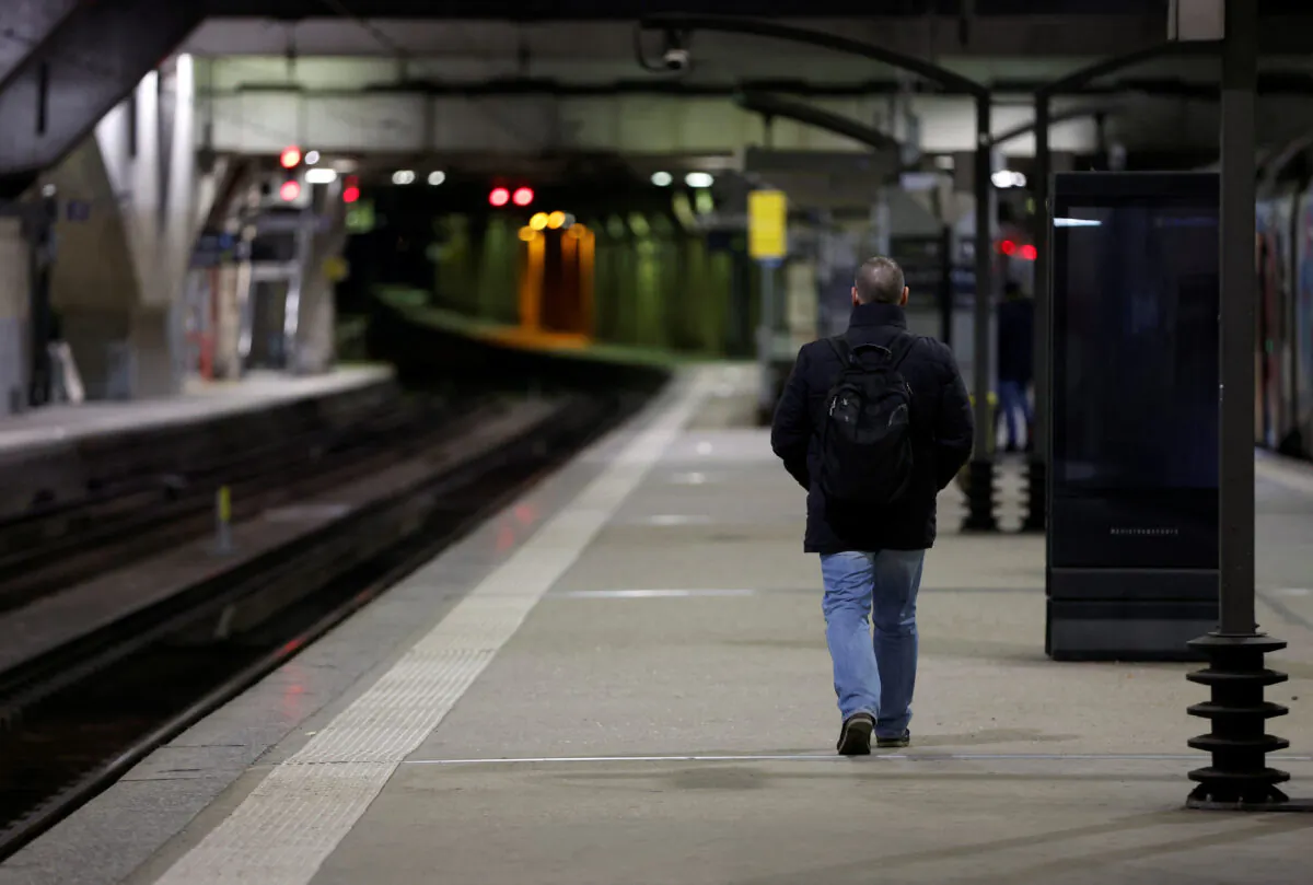 A man walks on a platform at Gare Montparnasse railway station during a strike by French SNCF workers in Paris in France, on Jan. 19, 2023. (Gonzalo Fuentes/Reuters)