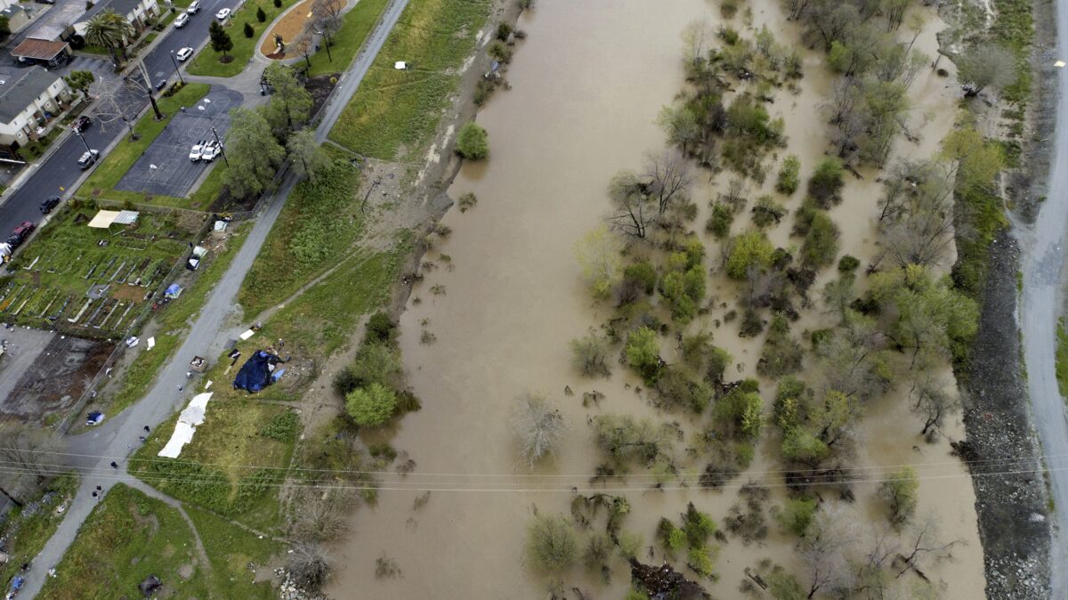 NextImg:Floods Fill Some of California's Summer Strawberry Fields