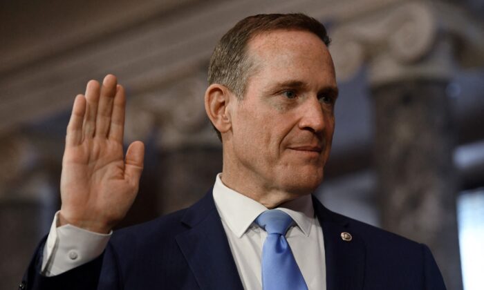 Republican Senator Ted Budd of North Carolina is ceremonially sworn in by Vice President Kamala Harris for the 118th Congress in the Old Senate Chamber at the U.S. Capitol in Washington on Jan. 3, 2023. (Olivier Douliery/AFP via Getty Images)