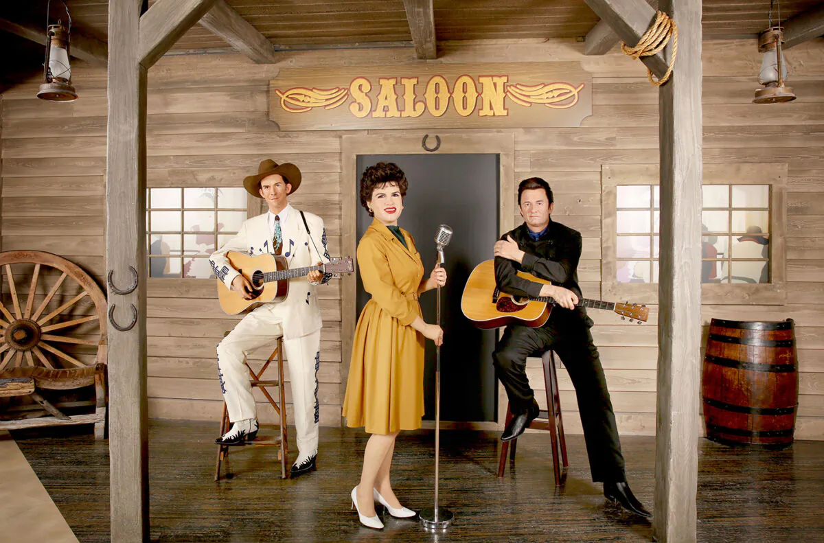Singer-songwriters of country's golden age are still celebrated today, being the most widely covered songs in the business. Madame Tussauds Hollywood set with country music legends (L) Hank Williams Sr., Patsy Cline, and Johnny Cash. (Rachel Murray/Getty Images)