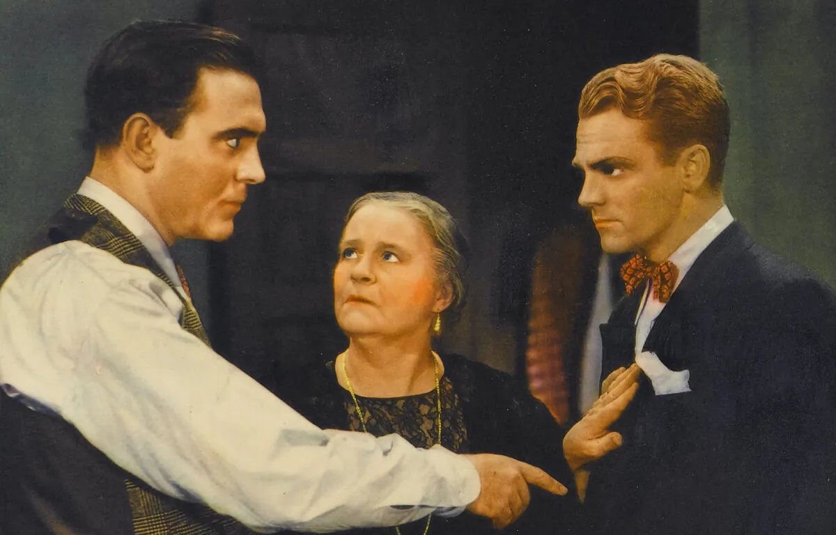 (L-R) Pat O’Brien, Mary Gordon, and James Cagney in a lobby card for "The Irish in Us" film. (MovieStillsDB)