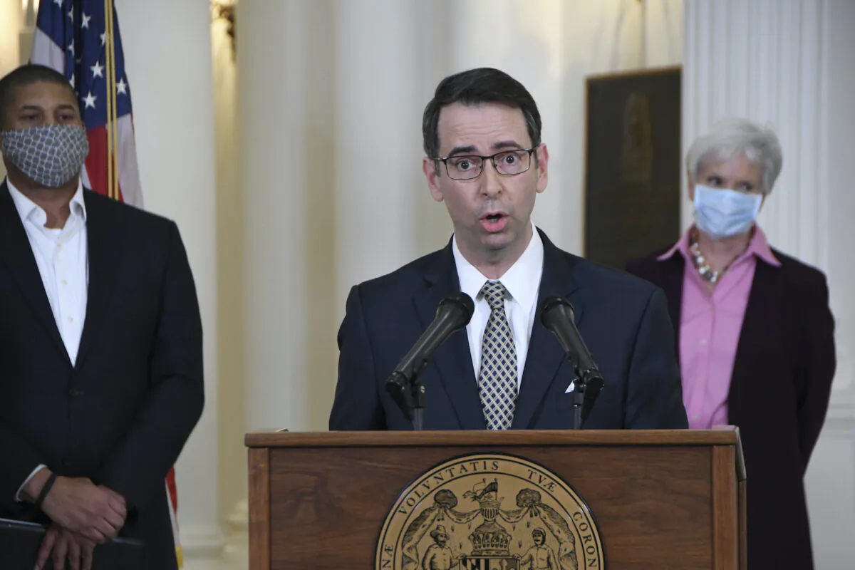Roy McGrath, chief executive officer of the Maryland Environmental Service, speaks during a news conference at the State House in Annapolis, Md., on April 15, 2020. A federal judge has issued an arrest warrant for McGrath, the one-time aide to former Maryland Gov. Larry Hogan, after McGrath failed to appear in court as his trial on federal fraud charges was set to begin. (Pamela Wood/The Baltimore Sun via AP)
