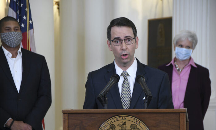 Roy McGrath, chief executive officer of the Maryland Environmental Service, speaks during a news conference at the State House in Annapolis, Md., on April 15, 2020. A federal judge has issued an arrest warrant for McGrath, the one-time aide to former Maryland Gov. Larry Hogan, after McGrath failed to appear in court as his trial on federal fraud charges was set to begin. (Pamela Wood/The Baltimore Sun via AP)