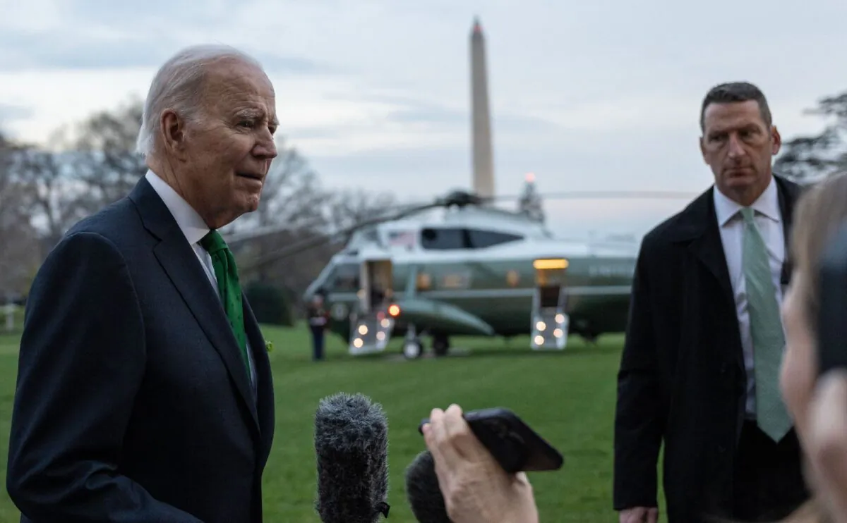 President Joe Biden talks to the media before boarding Marine One from the South Lawn of the White House in Washington, on March 17, 2023. (ANDREW CABALLERO-REYNOLDS/AFP via Getty Images)