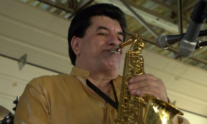 Fito Olivares performs during the Cinco de Mayo celebration held at Rosedale Park in San Antonio, Texas, on May 5, 2002. (Edward A. Ornelas/The San Antonio Express-News via AP)