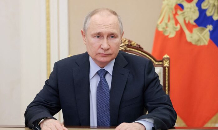 Russian President Vladimir Putin chairs a meeting with members of the Security Council via video link in Moscow, Russia, on March 17, 2023. (Mikhail Metzel/Sputnik/Kremlin via Reuters)