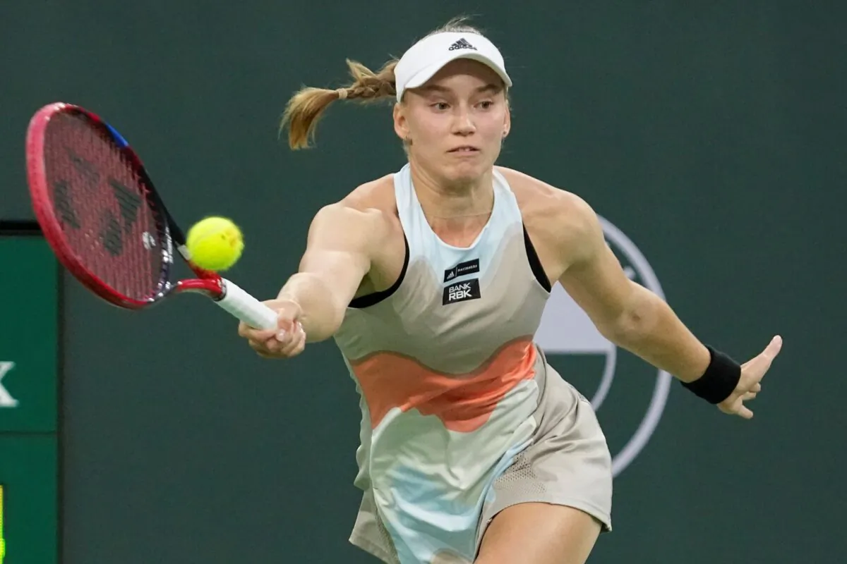 Elena Rybakina, of Kazakhstan, returns a shot to Iga Swiatek, of Poland, during a semifinal match at the BNP Paribas Open tennis tournament in Indian Wells, Calif., on March 17, 2023. (Mark J. Terrill/AP Photo)