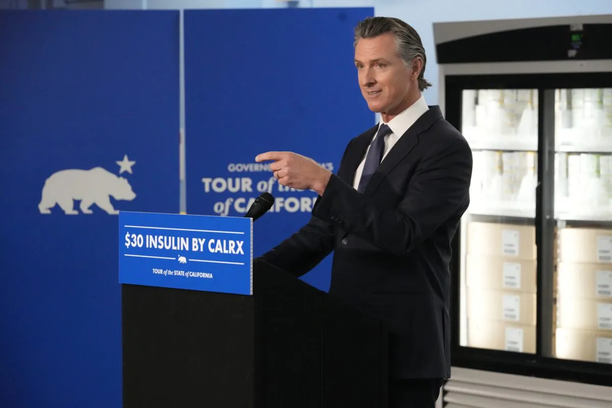 California Gov. Gavin Newsom announces a partnership with Civica Rx, a non-for-profit pharmaceutical company intended to manufacture insulin for the State of California's CalRx Biosimilar Insulin Initiative, at a dramatically lower cost, during a visit to a Kaiser Permanente warehouse in Downey, Calif., on March 18, 2023. (Damian Dovarganes/AP Photo)