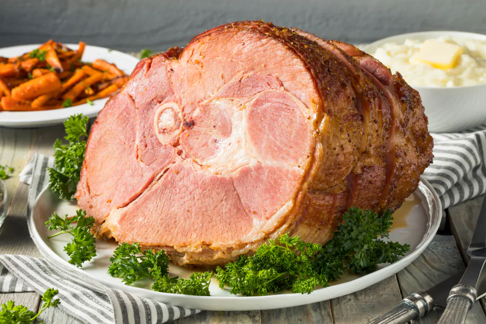 Ham has long been the meat of choice for Easter, and there are countless ways to prepare it for a special family dinner.(Brent Hofacker/Shutterstock)