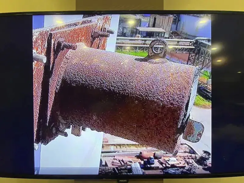 This image made on March 14, 2023, shows a radioactive cylinder, a steel tube 30 cm (12 inches) long and 13 cm (5 inches) in diameter that has gone missing from a steam power plant in Thailand's eastern province of Prachinburi. The video was taken in December 2022. (The Prachinburi Provincial Public Relations Office via AP)