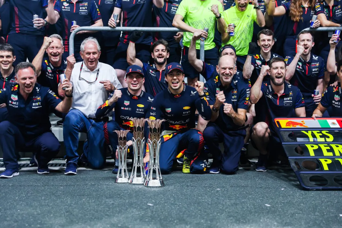 Race winner Sergio Perez of Mexico and Oracle Red Bull Racing, Second placed Max Verstappen of the Netherlands, and Oracle Red Bull Racing and the Red Bull Racing team celebrate after the F1 Grand Prix of Saudi Arabia at Jeddah Corniche Circuit in Jeddah, Saudi Arabia, on March 19, 2023. (Lars Baron/Getty Images)
