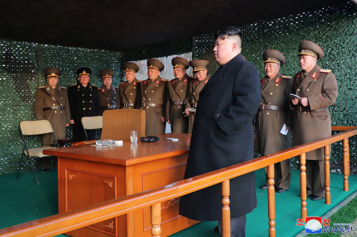 North Korean leader Kim Jong Un watches a fire assault drill at an undisclosed location in North Korea on March 10, 2023, in this photo released by North Korea's Korean Central News Agency (KCNA). (KCNA via Reuters)