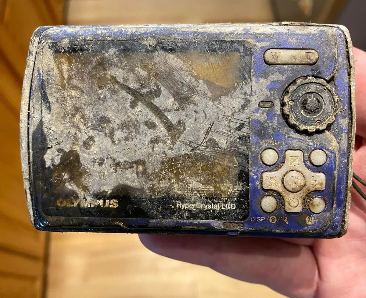 Spencer Greiner holds the camera he found while fishing in a Colorado river in March 2023. (Courtesy of Spencer Greiner) 