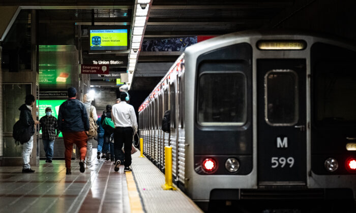 Passengers use the Westlake/MacArthur Park train station in Los Angeles, Calif., on March 20, 2023. (John Fredricks/The Epoch Times)