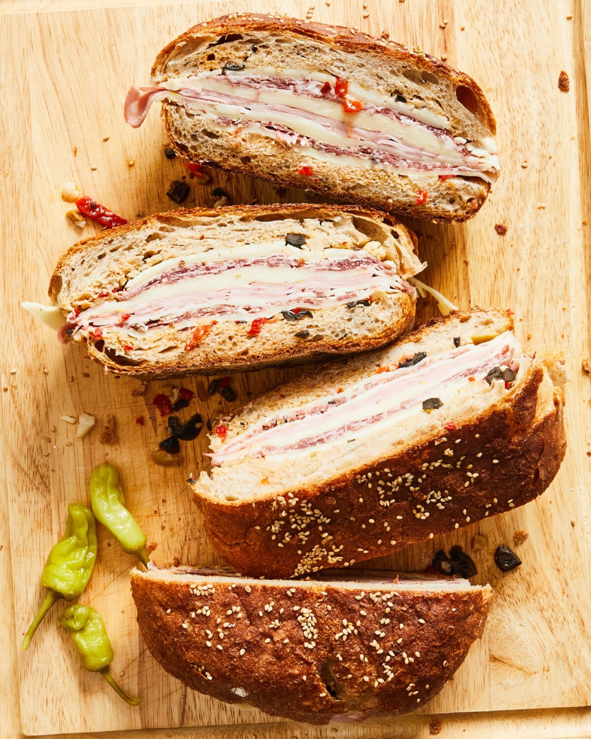 NextImg:This Over-the-Top Muffuletta Sandwich Is a Meat-Lovers Dream