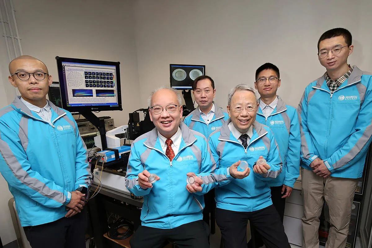 Professor Chan Chi-hou (second from the left, front row), Professor Tsai Din-Ping (right, front row), and researchers at CityU have developed a novel tunable terahertz meta-device. (Courtesy of the City University of Hong Kong)