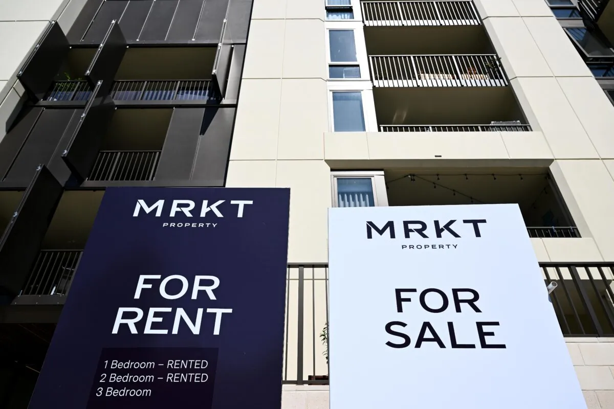 A ‘For Rent’ and a ‘For Sale’ sign is seen in Canberra, Australia on Feb. 27, 2023. (AAP Image/Lukas Coch)
