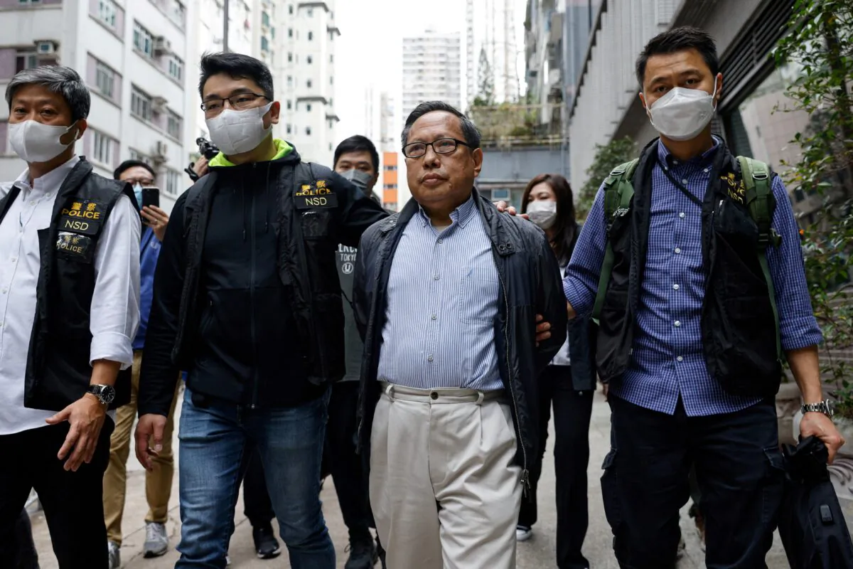 Former Vice-Chairman of the Hong Kong Alliance in Support of Patriotic Democratic Movements of China, Albert Ho, walks after his arrest by police, in Hong Kong, on March 21, 2023. (Tyrone Siu/Reuters)