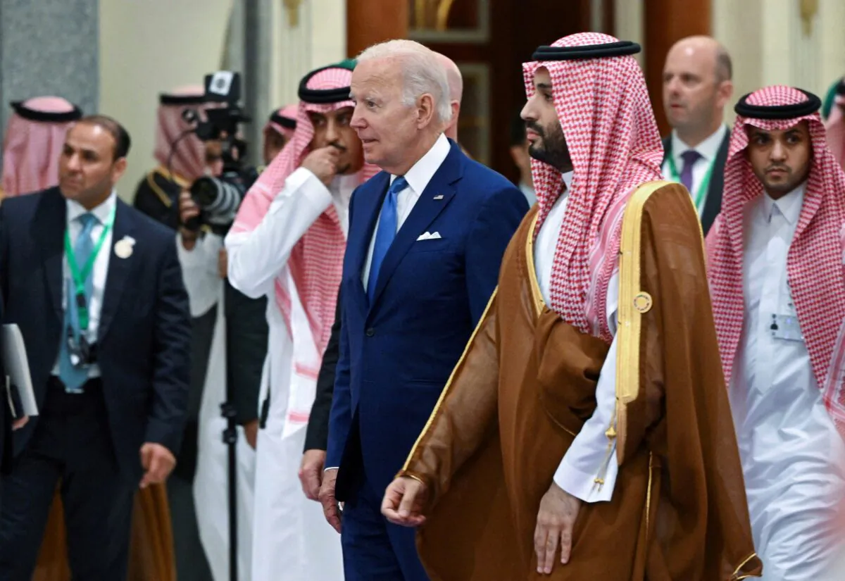U.S. President Joe Biden and Saudi Crown Prince Mohammed bin Salman arrive for the family photo during the Jeddah Security and Development Summit (GCC+3) at a hotel in Jeddah, Saudi Arabia, on July 16, 2022. (Mandel Ngan/Pool via Reuters)
