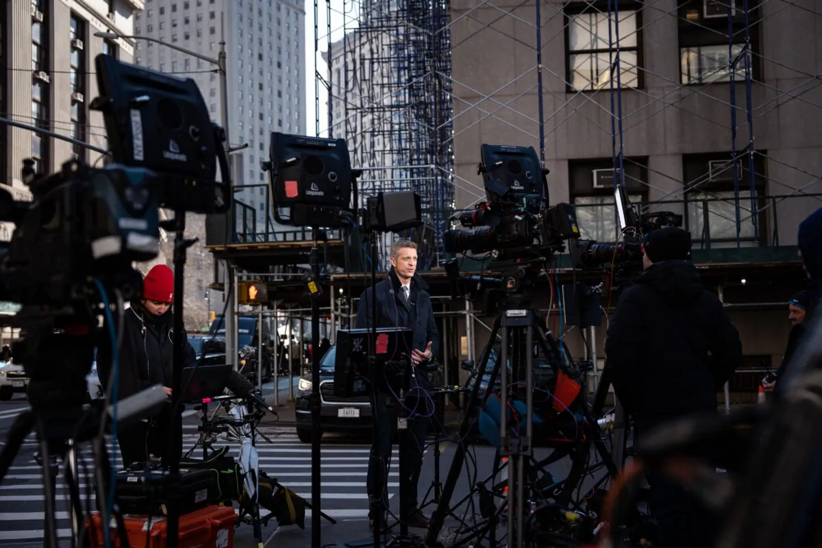 Reporters outside the Manhattan Criminal Court in New York City on March 20, 2023. (Samira Bouaou/The Epoch Times)