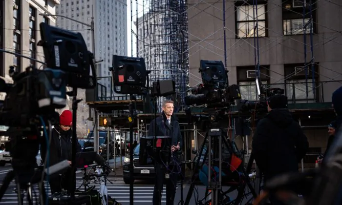 Reporters outside the Manhattan Criminal Court in New York City on March 20, 2023. (Samira Bouaou/The Epoch Times)